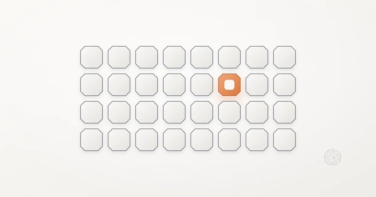 A grid of thirty-two identical light grey tiles with cut corners, one of them orange with a white inner square, and a faint small stone mark in the lower right.
