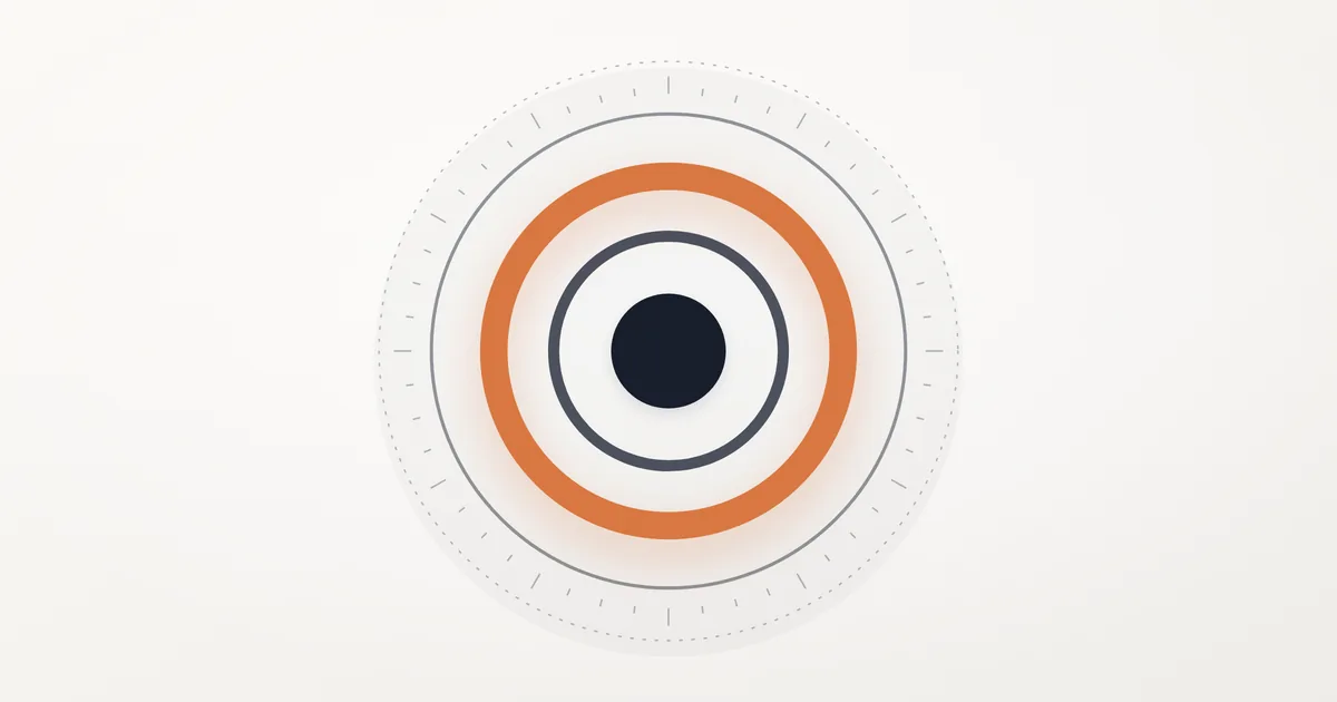 Concentric rings of different thickness around a dark centre disc, with the thick middle ring in orange and a fine dotted outer ring, on a light background.