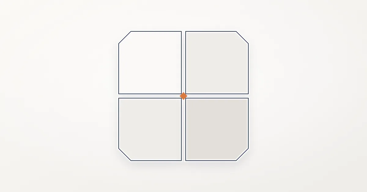 One square block split into four light grey panels by thin gaps, with a small orange diamond where the gaps cross.
